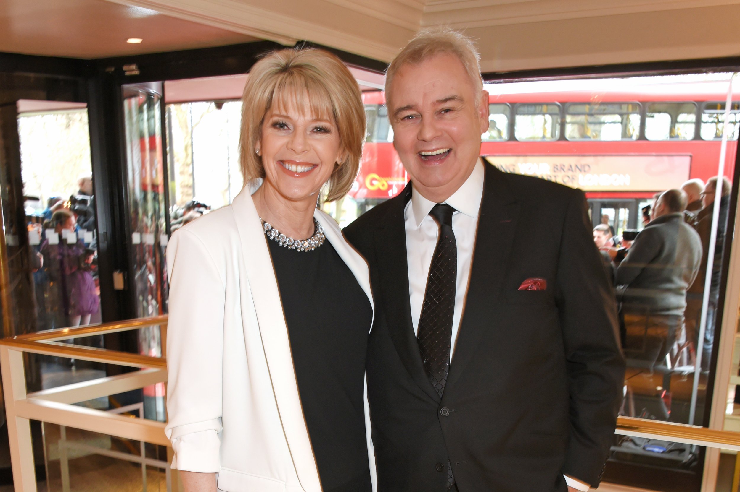 Ruth Langsford wearing a black dress and Eamonn Holmes in a suit at the TRIC Awards